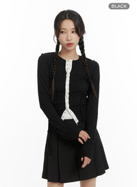 contrasting-button-long-sleeve-top-cm427 / Black